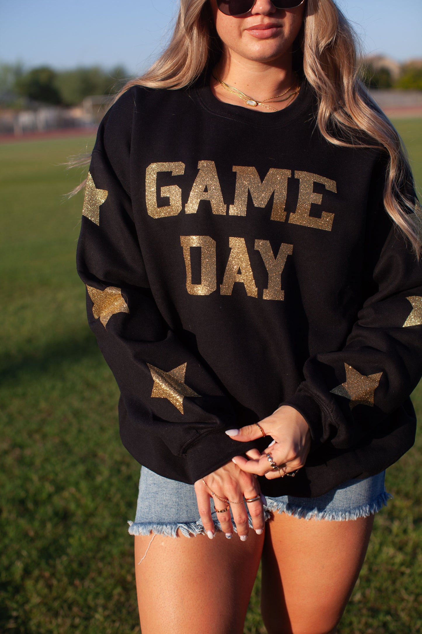 Glam girl glitter game day sweatshirt in black+ gold