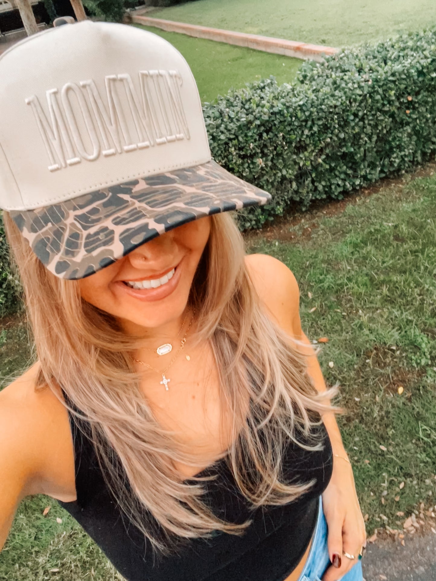Leopard Mommin trucker hat